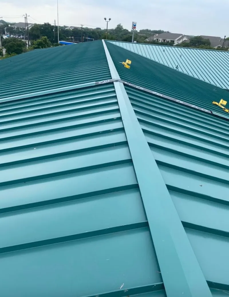 Green commercial metal roof ridge and valley for Metal Roof Repair in Saline